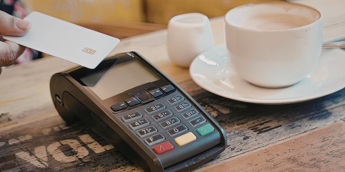 Abstract image of digital payment icons overlaid with green sustainability symbols, representing the intersection of fintech and ESG goals.