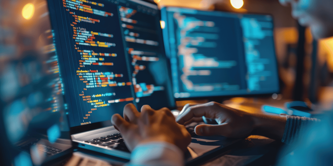 person-testing-code-on-laptop